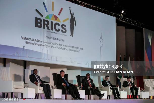 Deputy President of South Africa David Mabuza, President of China Xi Jinping, President of the Republic of South Africa Cyril Ramaphosa attend a...