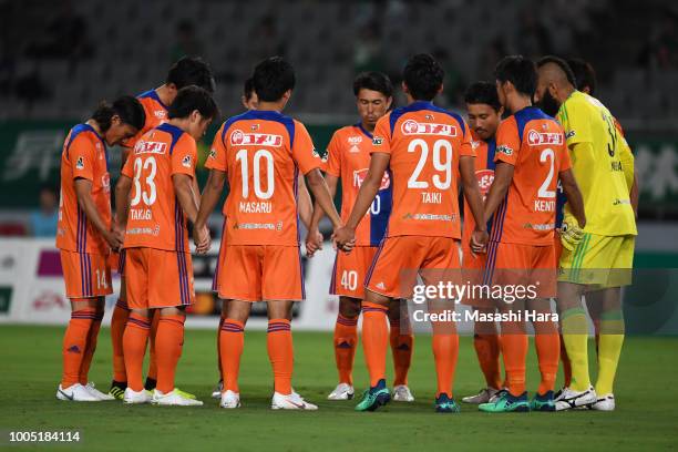 Players of Albirex Niigata make the huddle during the J.League J2 match between Tokyo Verdy and Albirex Niigata at Ajinomoto Stadium on July 25, 2018...