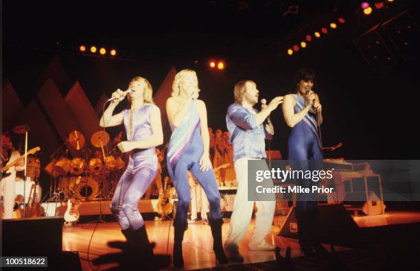 Bjorn Ulvaeus, Agnetha Faltskog, Anni-Frid Lyngstad and Benny Andersson of Swedish pop group Abba perform on stage at Wembley Arena in London,...