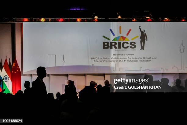 Delegates attend a Business Forum organised during the 10th BRICS summit on July 25, 2018 at the Sandton Convention Centre in Johannesburg, South...