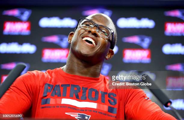 New England Patriots' Matthew Slater smiles as he is asked a question during a media availability on the opening day of Patriots training camp at the...