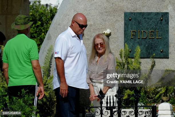 The widow of Cuban leader Fidel Castro, Dalia Soto del Valle , visits his tomb at the Santa Ifigenia cemetery in Santiago de Cuba, eastern Cuba, on...
