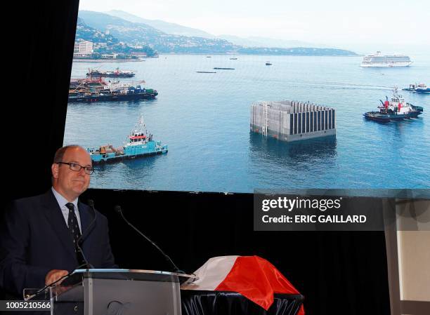 Prince Albert of Monaco delivers a speech on principality's offshore land reclaimation extension project - concrete-filled chambers called caissons,...