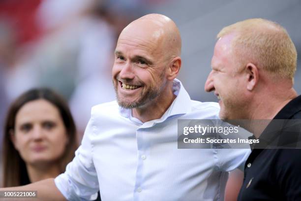 Coach Erik ten Hag of Ajax, coach Heiko Vogel of SK Sturm Graz during the UEFA Champions League match between Ajax v SK Sturm Graz at the Johan...