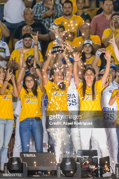 Players of female Tigres team show the trophy they won on the past tournament prior the 1st round match between Tigres UANL and Leon as part of the...