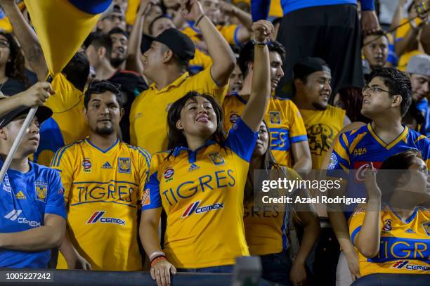 Fans of Tigres cheer their team during the 1st round match between Tigres UANL and Leon as part of the Torneo Apertura 2018 Liga MX at Universitario...