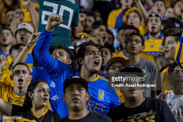 Fans of Tigres cheer their team during the 1st round match between Tigres UANL and Leon as part of the Torneo Apertura 2018 Liga MX at Universitario...