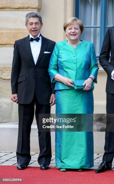 German Chancellor Angela Merkel and her husband Joachim Sauer during the opening ceremony of the Bayreuth Festival at Bayreuth Festspielhaus on July...