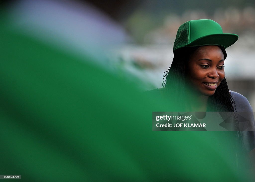 A Nigerian fan attends their friendly ma