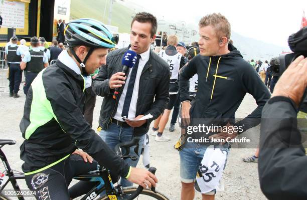 Tanel Kangert of Estonia and Astana Pro Team is interviewed by Louis-Pierre Frileux of Eurosport and consultant Steve Chainel following stage 17 of...