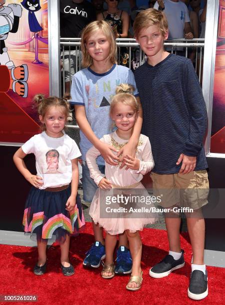 Chales Stauffer, Finn Stauffer, Emma Stauffer and Mila Stauffer arrive at the Los Angeles premiere of Warner Bros. Animations' 'Teen Titans Go! To...