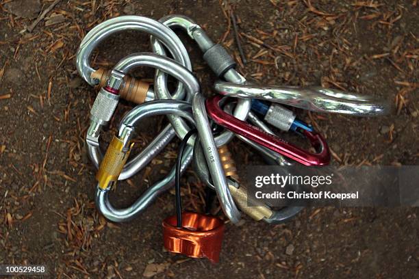 Locking snap hooks are seen at the GHW tightrobe climbing garden on May 25, 2010 in Hueckeswagen, Germany.