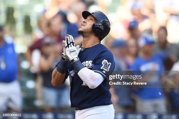 Hernan Perez of the Milwaukee Brewers celebrates a home run against the Washington Nationals during the ninth inning of a game at Miller Park on July...