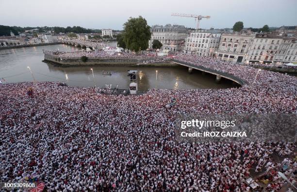 Crowds of revellers gather in front of The Town Hall in Bayonne on July 25 during the opening ceremony of The Fetes de Bayonne.