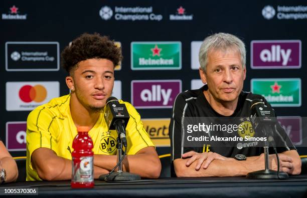 Lucien Favre, head coach of Borussia Dortmund, and Jadon Sancho speak during a press conference as part of Borussia Dortmund US Tour 2018 t to the...