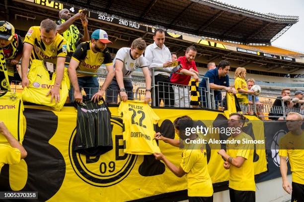 Maximilian Philipp and Achraf Hakimi of Borussia Dortmund sign autographs for the fans during Borussia Dortmund US Tour 2018 t to the United States...