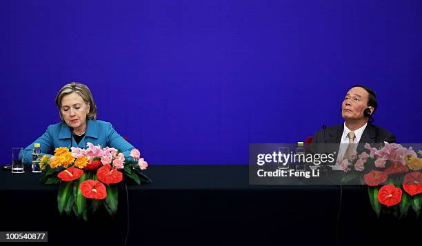 Secretary of State Hillary Clinton and China's Vice Premier Wang Qishan attend a press conference for the China-U.S. Strategic and Economic Dialogue...