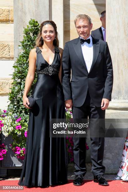 German politician Christian Lindner with his partner Franca Lehfeldt during the opening ceremony of the Bayreuth Festival at Bayreuth Festspielhaus...