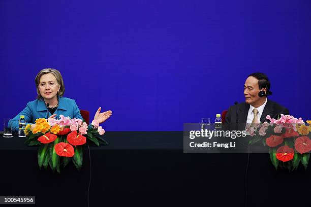 Secretary of State Hillary Clinton and China's Vice Premier Wang Qishan attend a press conference for the China-U.S. Strategic and Economic Dialogue...