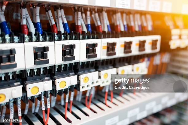 many socket and electrical relay (switch automatic or electromagnet ) for operated electric circuit of machine or industrial - schaltschrank stock-fotos und bilder