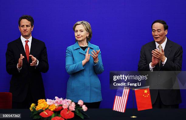 Secretary of State Hillary Clinton , U.S. Treasury Secretary Timothy Geithner and China's Vice Premier Wang Qishan attend a press conference during...