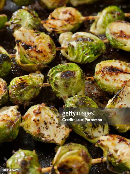 bbq brussels sprouts with grainy mustard, honey glaze - glazen pot stock pictures, royalty-free photos & images