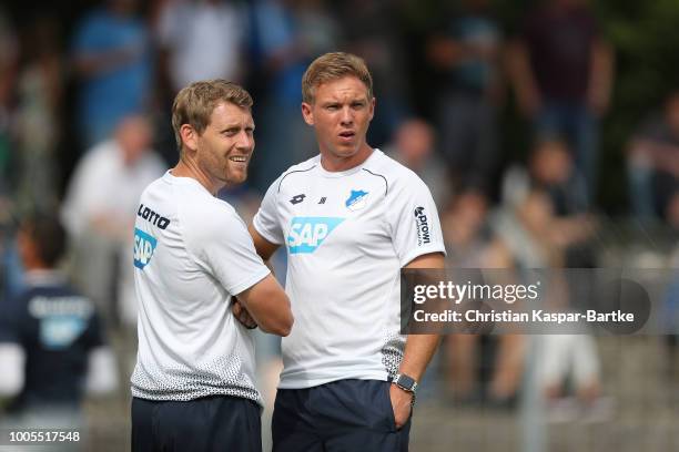 Head coach Julian Nagelsmann and goalkeeper coach of Hoffenheim look on prior to the pre-saeson friendly match between Queens Park Rangers and TSG...