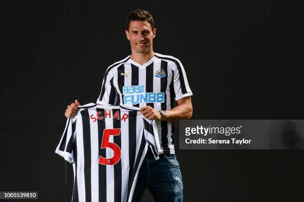 Fabian Schar poses for photographs at the Newcastle United Training Centre on July 26 in Newcastle upon Tyne, England.