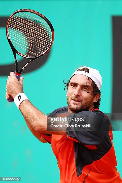 Santiago Ventura of Spain plays a backhand during the men's singles first round match between Santiago Ventura of Spain and Andreas Seppi of Italy on...