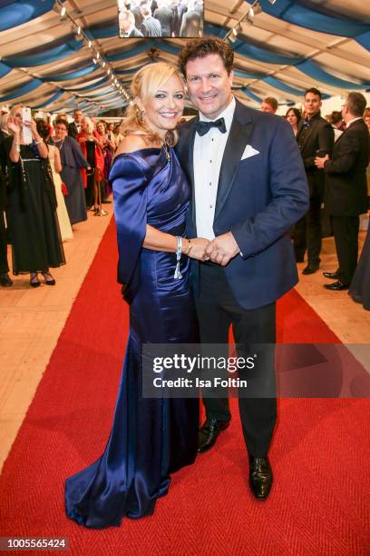 German actor Francis Fulton Smith and his girlfriend Claudia Hillmeier attends the Bayreuth Festival 2018 state reception at Neues Schloss on July...