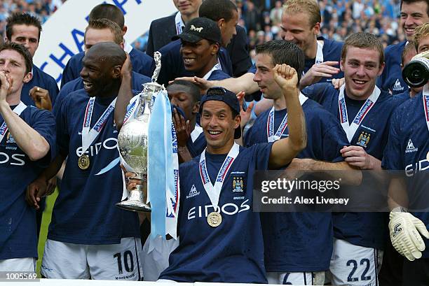 Ali Benarbia and the Man City team celebrate winning the First Division Championship after the Nationwide First Division game between Manchester City...