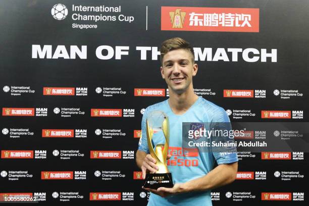 Luciano Vietto of Atletico Madrid is named Man of the Match during the International Champions Cup 2018 match between Atletico Madrid and Arsenal at...