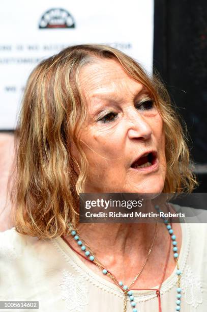 Julia Baird, the half sister of John Lennon looks on as fans of Paul McCartney wait outside The Cavern Club, as the singer plays a one off gig at the...