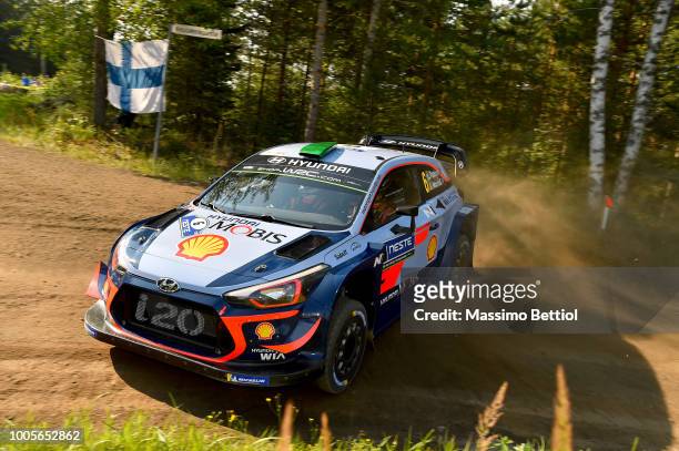 Hayden Paddon of New Zealand and Sebastian Marshall of Great Britain compete in their Hyundai Shell Mobis WRT Hyundai i20 coupe WRC during the...