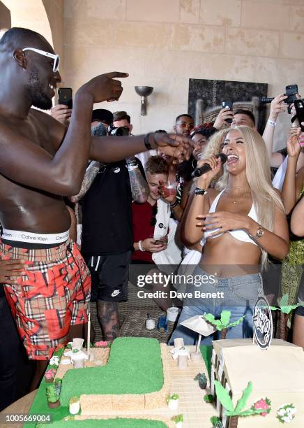 Stormzy and Maya Jama speak before cutting his cake, as Spotify Premium throws the ultimate party in Spain for Stormzy's 25th birthday on July 26,...