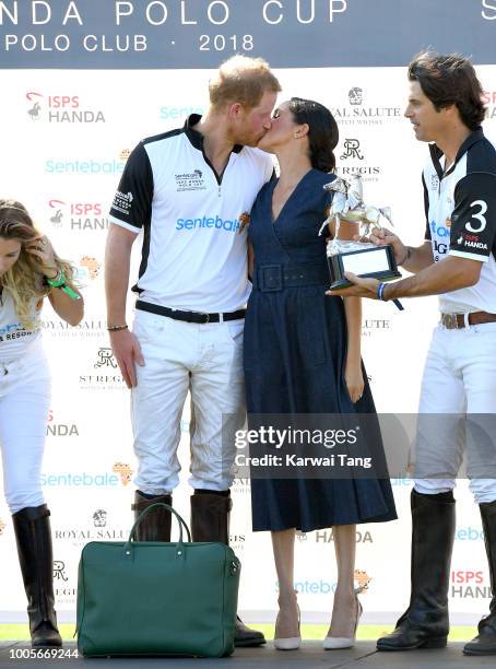 Meghan, Duchess of Sussex and Prince Harry, Duke of Sussex attend the Sentebale ISPS Handa Polo Cup at the Royal County of Berkshire Polo Club on...