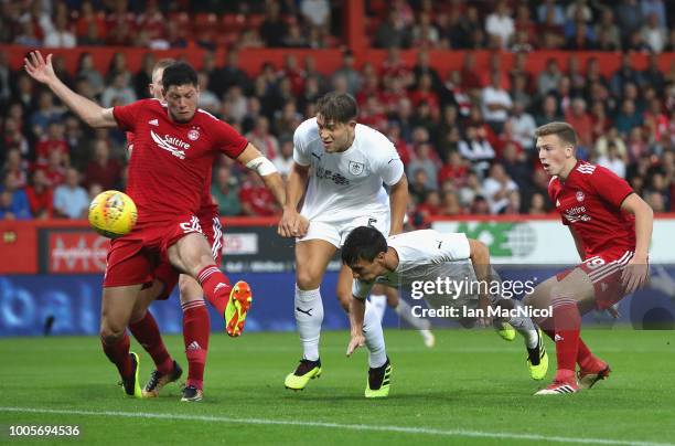 Jack Cork of Burnley heads at goal during the UEFA Europa League Second Qualifying Round 1st Leg match between Aberdeen and Burnley at Pittodrie...