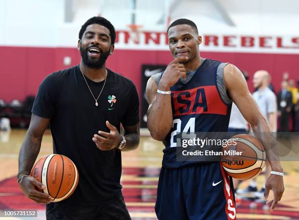 Kyrie Irving and Russell Westbrook of the United States joke around during a practice session at the 2018 USA Basketball Men's National Team minicamp...