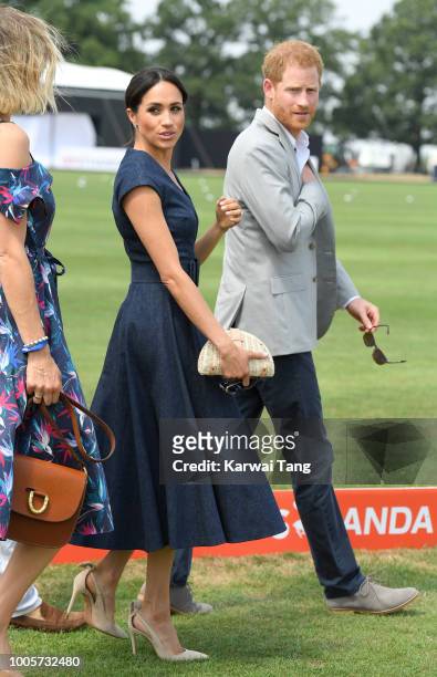 Meghan, Duchess of Sussex and Prince Harry, Duke of Sussex attend the Sentebale ISPS Handa Polo Cup at the Royal County of Berkshire Polo Club on...