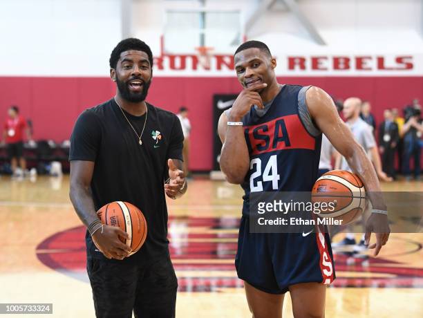 Kyrie Irving and Russell Westbrook of the United States joke around during a practice session at the 2018 USA Basketball Men's National Team minicamp...