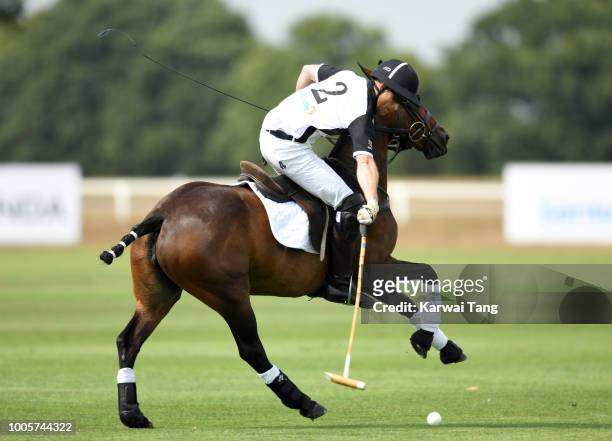Prince Harry, Duke of Sussex competes in the Sentebale ISPS Handa Polo Cup at the Royal County of Berkshire Polo Club on July 26, 2018 in Windsor,...