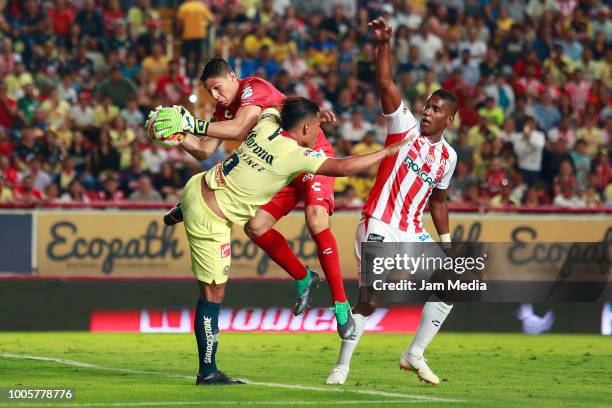 Hugo Gonzalez of Necaxa fights for the ball with Roger Martinez of America during the 1st round match between Necaxa and America as part of the...