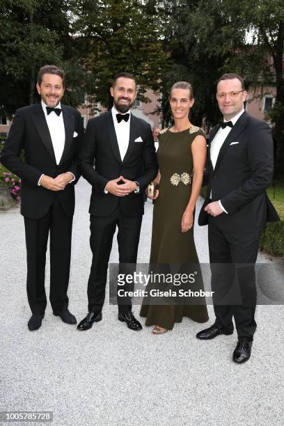 Austrian politician Harald Mahrer and his wife Andrea Samonigg-Mahrer, Daniel Funke and his husband minister Jens Spahn during the ISA gala at...