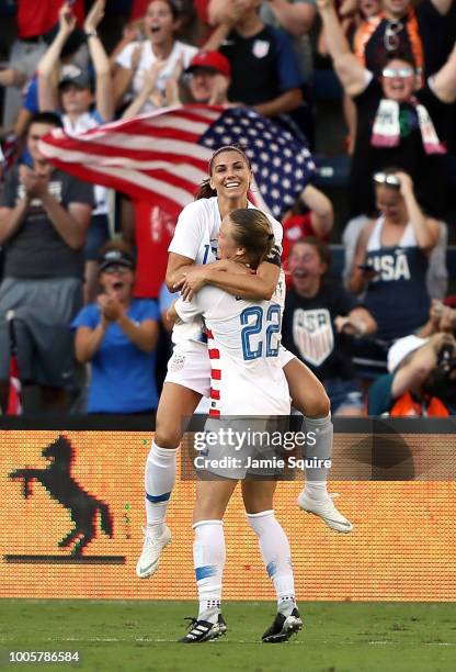 Alex Morgan of the United States celebrates with Emily Sonnett after scoring during their Tournament Of Nations match against Japan at Children's...