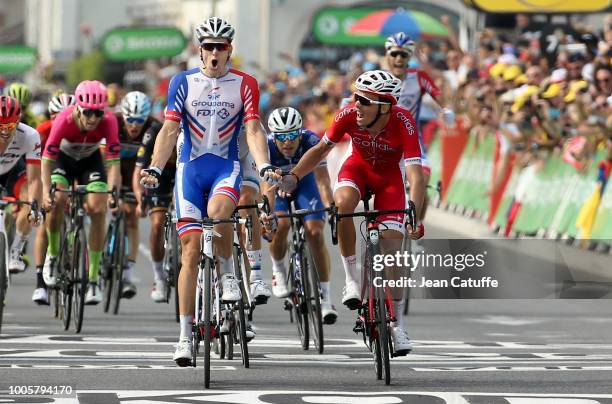 Arnaud Demare of France and Groupama FDJ celebrates winning in front of Christophe Laporte of France and Cofidis stage 18 of Le Tour de France 2018...