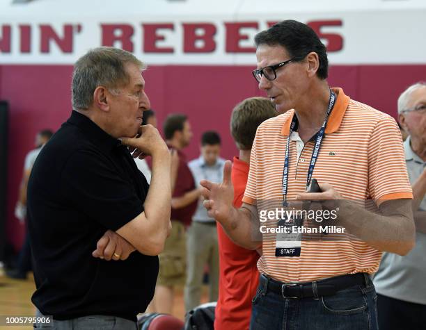 Managing director Jerry Colangelo of the United States talks with NBA Executive Vice President of Basketball Operations Kiki VanDeWeghe during a...