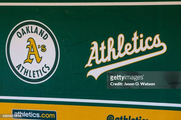 General view of the Oakland Athletics logos in the dugout before the game against the San Francisco Giants at the Oakland Coliseum on July 22, 2018...