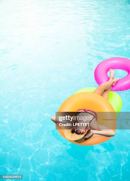 Woman Floating In Pool 7,805 Woman Floating In Swimming Pool Stock Photos, High-Res Pictures ...