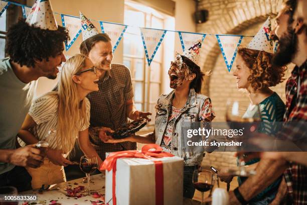 cake in the face for your birthday! - cake face imagens e fotografias de stock