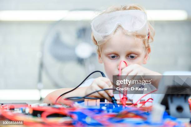engineer - young inventor stock pictures, royalty-free photos & images